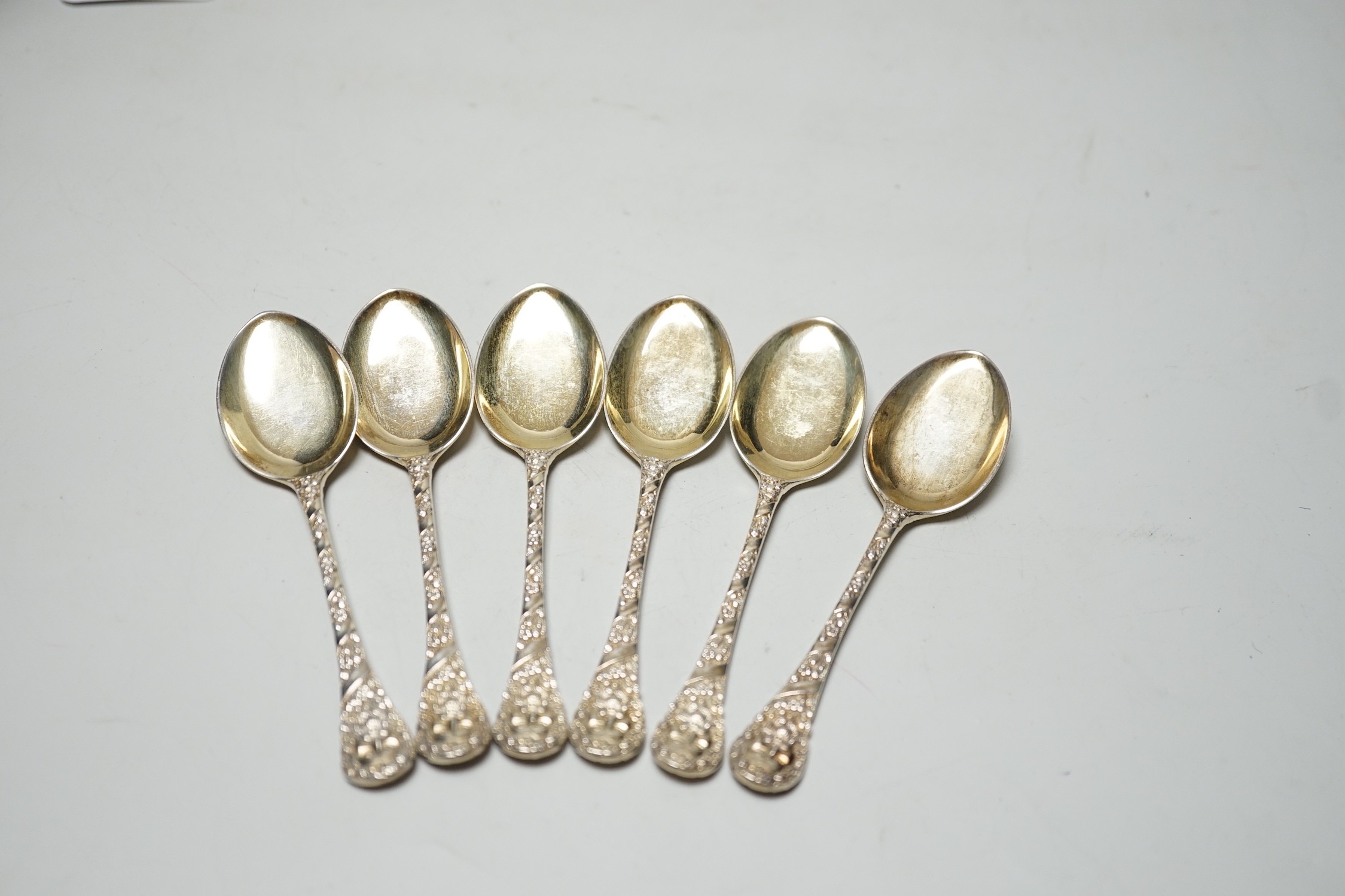 A set of six Edwardian silver gilt preserve spoons, Goldsmiths & Silversmiths Co Ltd, London, 1905, 12.2cm, 4oz.